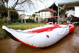 A man with an inflatable boat