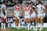 Dragons NRL players look dejected during loss to Cowboys.