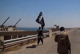 Islamic State militants at a Mosul dam