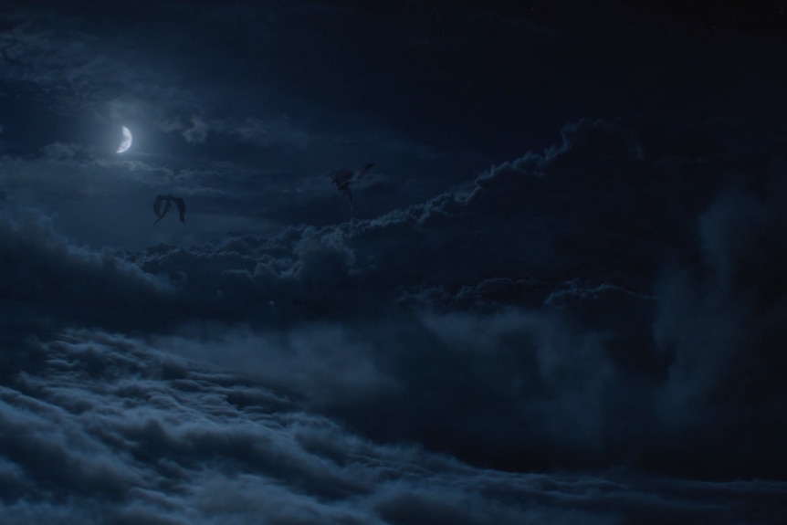 Two dragons loom in the sky in the still image from HBO's Game of Thrones