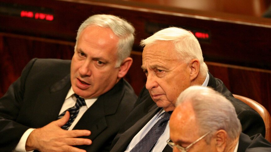 Israeli financial minister Benjamin Netanyahu, prime minister Ariel Sharon and vice premier Shimon Peres in Israel's parliament.