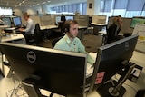 Workers answer phones at the Australian Financial Complaints Authority office.