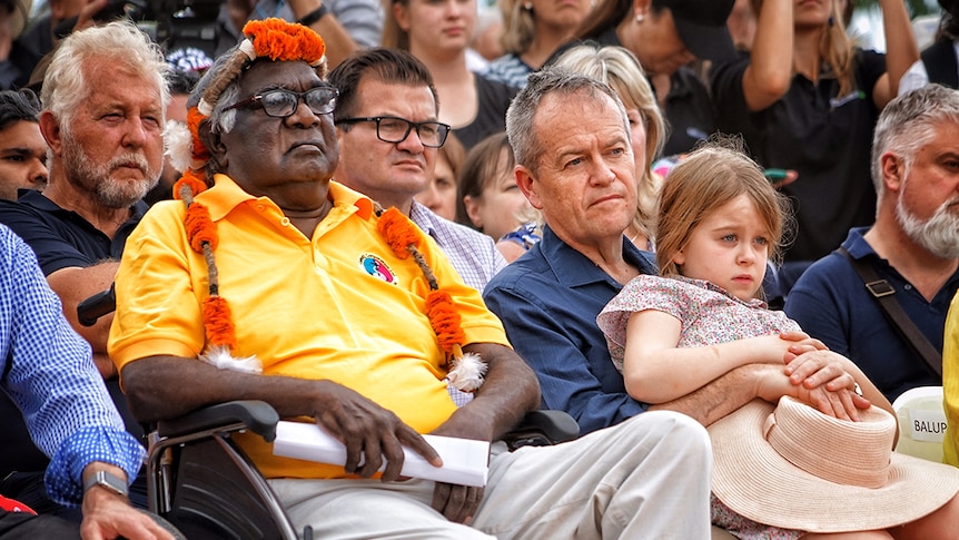 Indigenous leader Galarrwuy Yunupingu sits next to Opposition Leader Bill Shorten at the 2017 Garma festival.