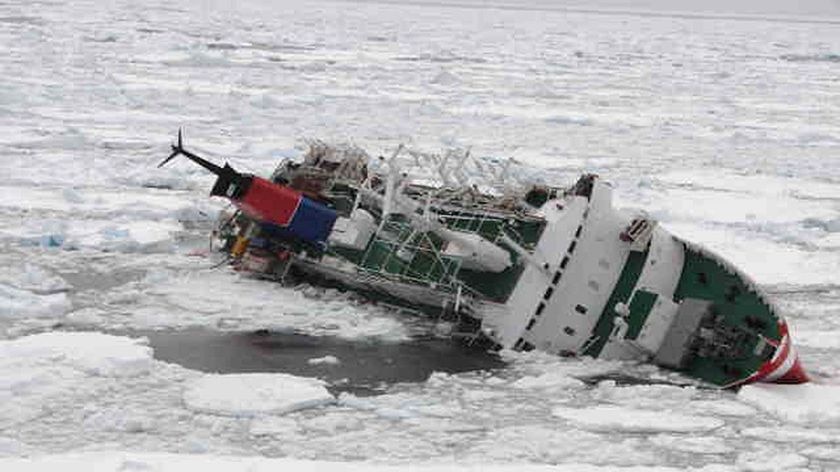 The MS Explorer begins to heel to starboard after hitting an iceberg