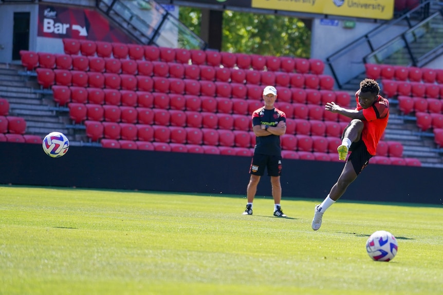 Adelaide United's Nestory Irankunda shoots for goal at training