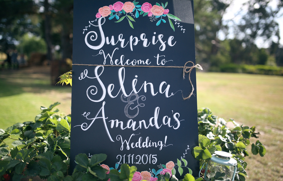 The sign announcing Amanda and Selina's surprise wedding to guests.
