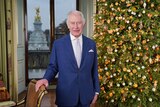 Britain's King Charles III poses for a photo, during the recording of his Christmas message.