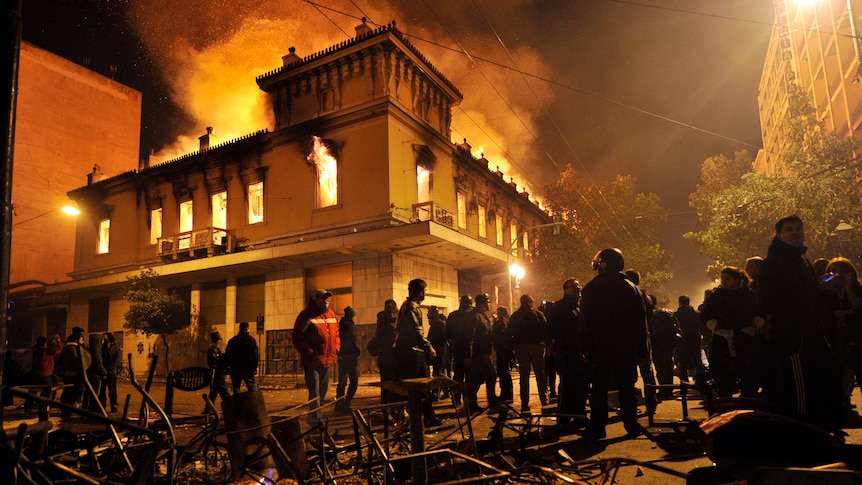 Athens building burns during protests