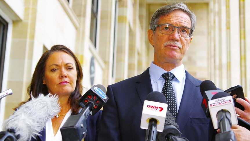 Mike Nahan addresses the media, while his deputy Liza Harvey stands alongside him.