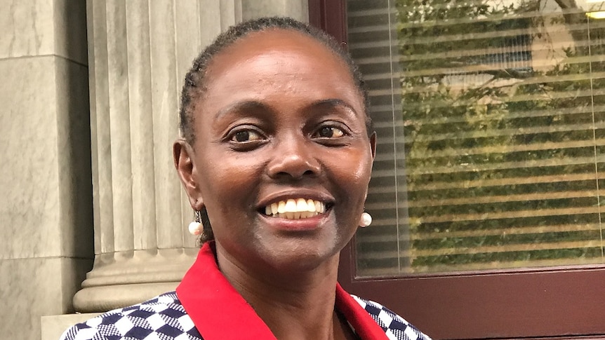Family First senator elect Lucy Gichuhi smiles.