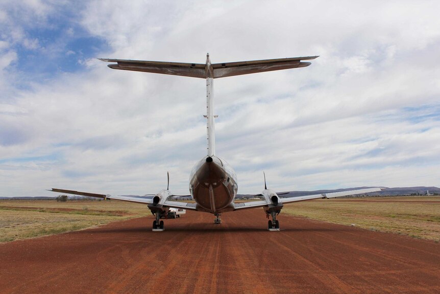 An Embraer EMB 120 Brasilia commuter airliner at the aircraft graveyard at Alice Springs Airport.