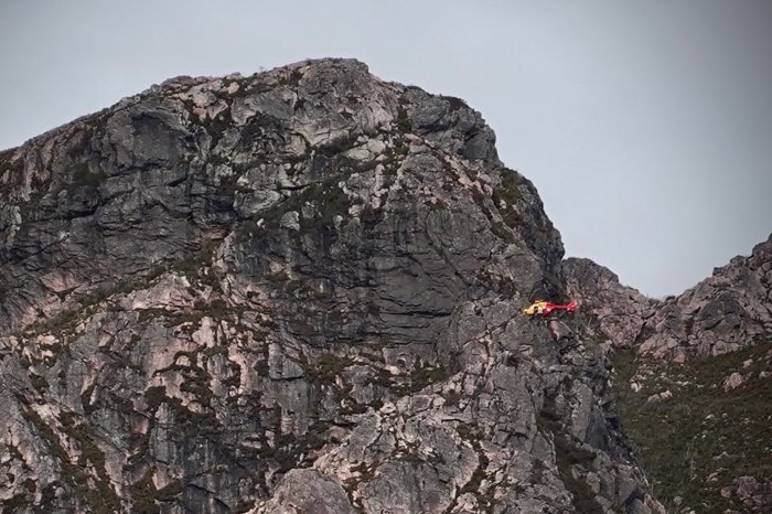 Westpac rescue helicopter over Sentinel Ranges, Tasmania.