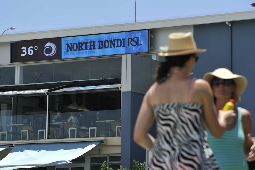 A board displays the temperature as 36C at North Bondi RSL.