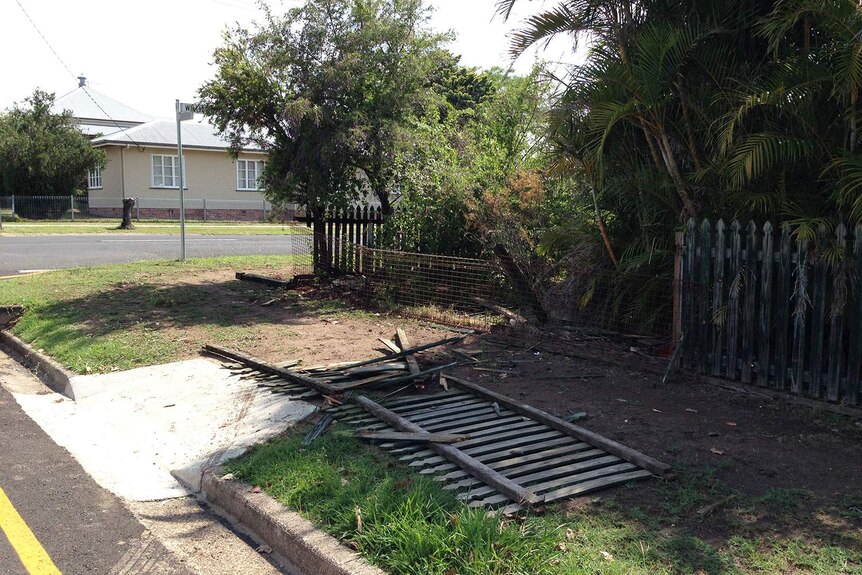 Destroyed fence that man crashed stolen car into at Laidley on December 21, 2016