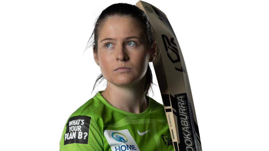 Woman stands in Sydney Thunder shirt holding a cricket bat.
