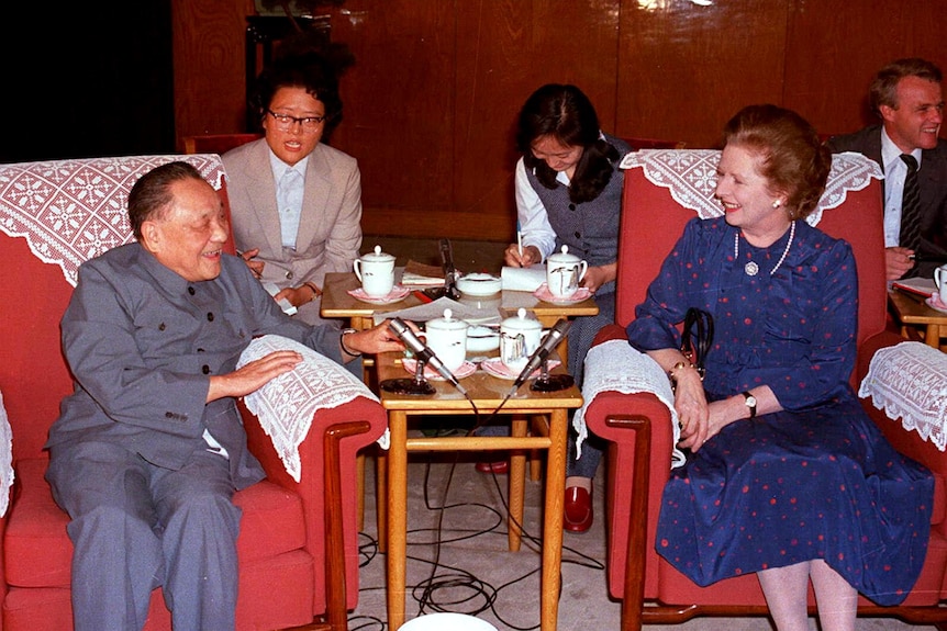 Deng Xiaoping meets with Margaret Thatcher.