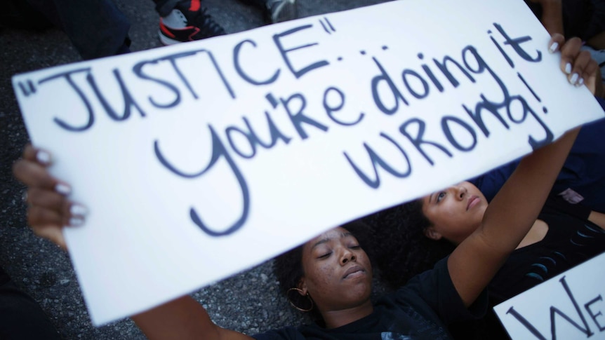 Ferguson placard 'Justice you're doing it wrong'