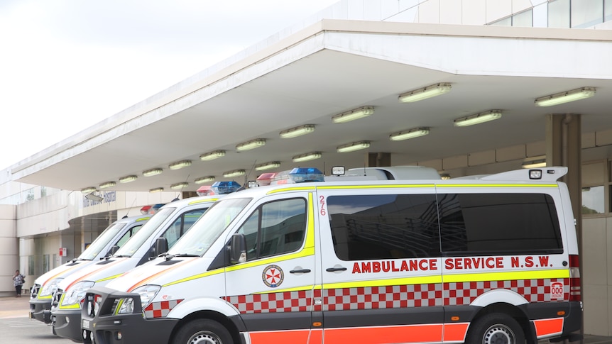 Ambulances queue outside Newcastle's John Hunter hospital.