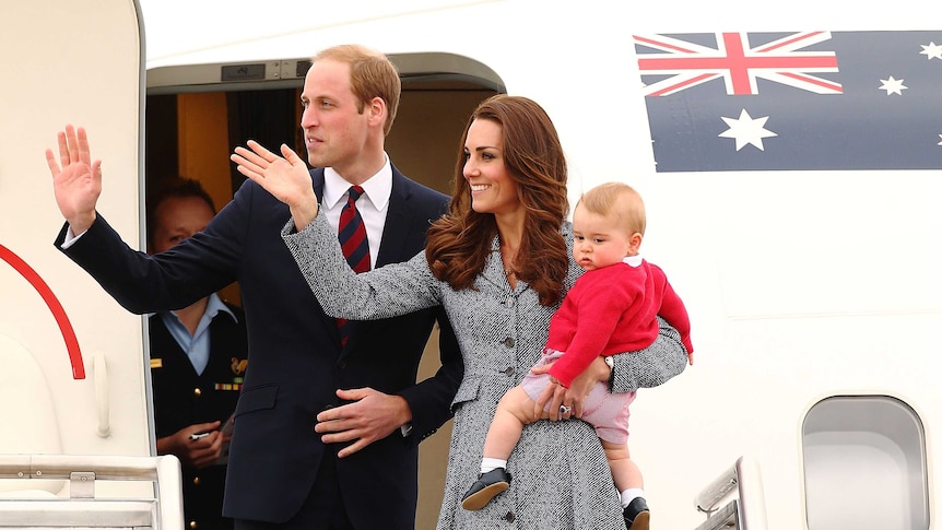 The Duke and Duchess of Cambridge and Prince George leave Fairbairn Airbase as they head back to the UK.