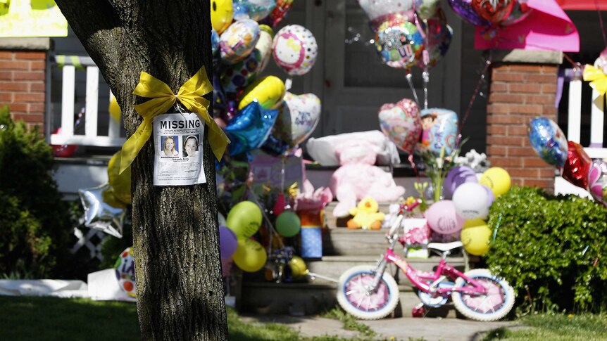 Balloons and presents sit outside Amanda Berry's house