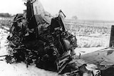 Wreckage of the plane crash in a snowy field