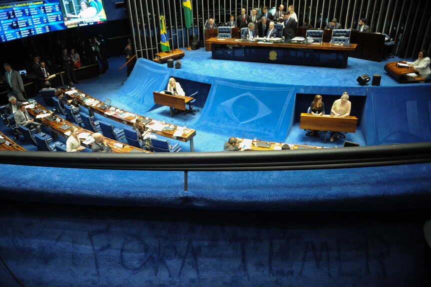Graffiti reading "Temer out!" seen in the gallery of the Brazilian Senate during a voting session