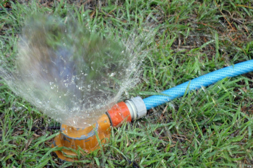 Generic water photo, garden sprinkler close up.