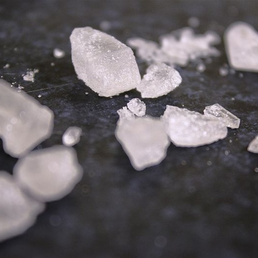 The drug ice sitting on a bench top.