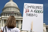 Protester calls for US debt compromise