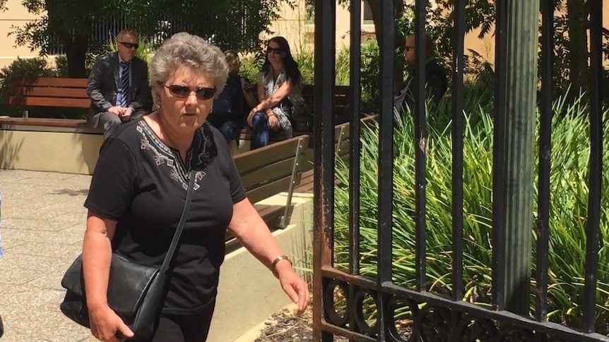 Families SA manager Julia Lamont leaves a royal commission hearing after giving evidence for four hours.