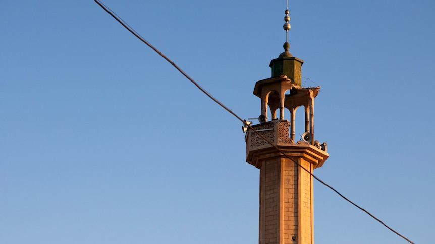 Rocket blast? The damaged minaret of a mosque in Taramseh.