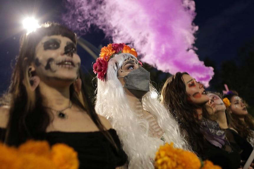 Women dressed as Catrinas.