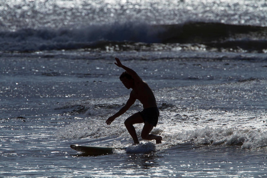 Sam surfing in Spirit of Akasha