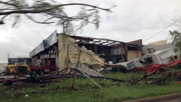 Buildings in the Townsville suburb of Duckworth are left destroyed by a 'mini-tornado'
