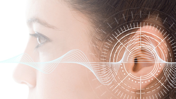 Graphic of soundwaves entering an ear