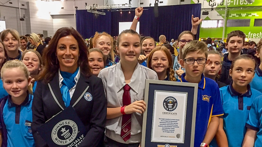 Students celebrate becoming world record holders for the world's largest science lesson.
