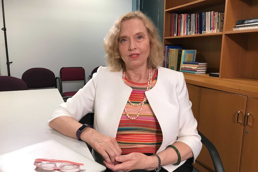 Dr Edwina Wright, of Alfred Health, sitting in an office.