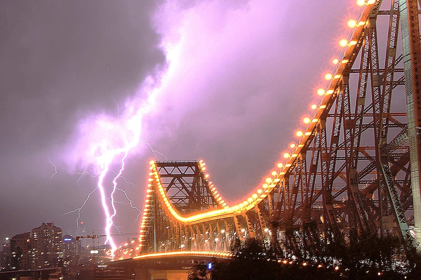 Lightning strikes the Brisbane CBD during fierce storms.