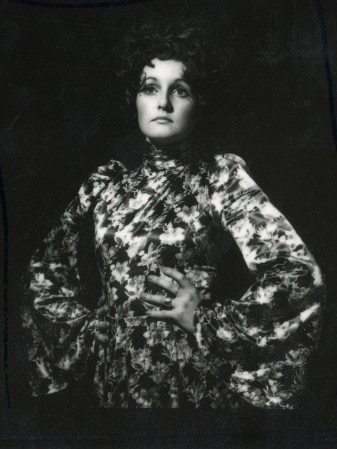 Black and white photo of Jackson wearing blouse with big, ballooning sleeves.