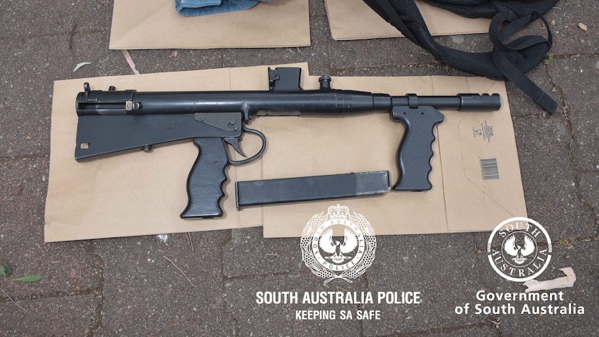 Fully-loaded machine gun found at Adelaide park linked to alleged bikie murder plot