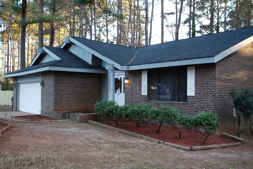 The home where a 13-year-old boy reported missing four years ago was found behind a fake wall.