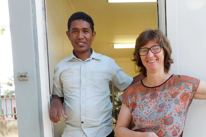 Filipe Soares and Jenny Geelen in the doorway of Filipe's clinic in Dili, East Timor
