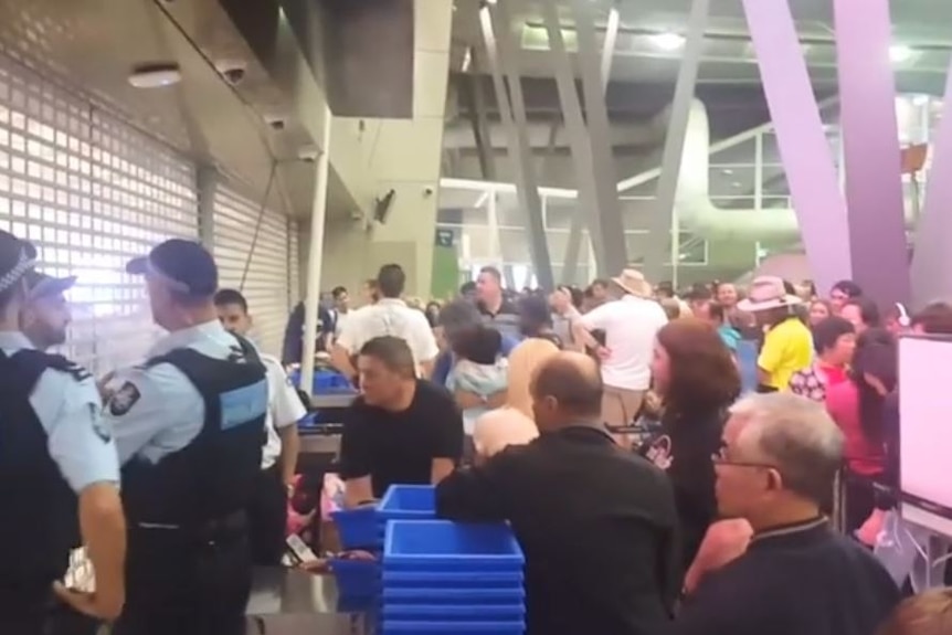 Crowds locked out of airport security.