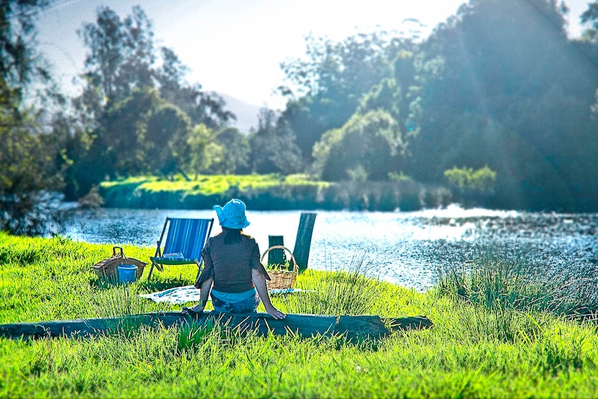 Fiona Hannaford enjoying a picnic by the river.