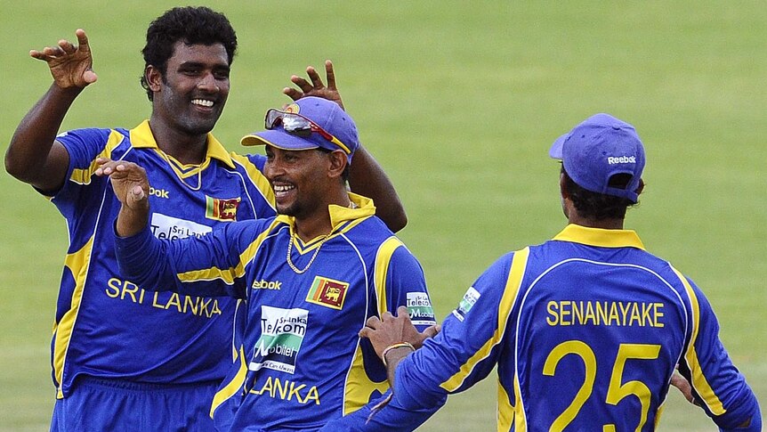 Sri Lankan players celebrate the dismissal of AB de Villiers.