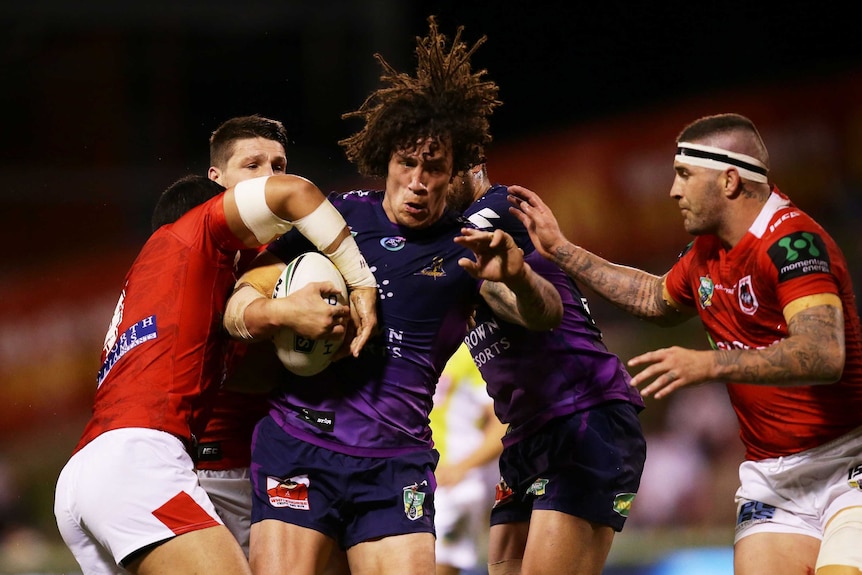 Kevin Proctor tries to break through the Dragons defence