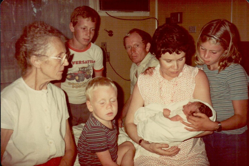 An old photo of the family gathered at the old Kununurra Hospital, following the birth of Fauke's daughter Maria.