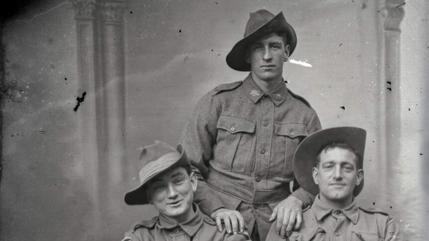 Three soldiers of the 1st Australian Division, probably 8th Battalion.