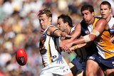 Hawthorn's Sam Mitchell in action against West Coast at Subiaco Oval in round two, 2013.