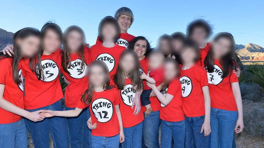 David and Louise Turpin with their 13 children wearing matching t-shirts saying "Thing" and numbering each family member.